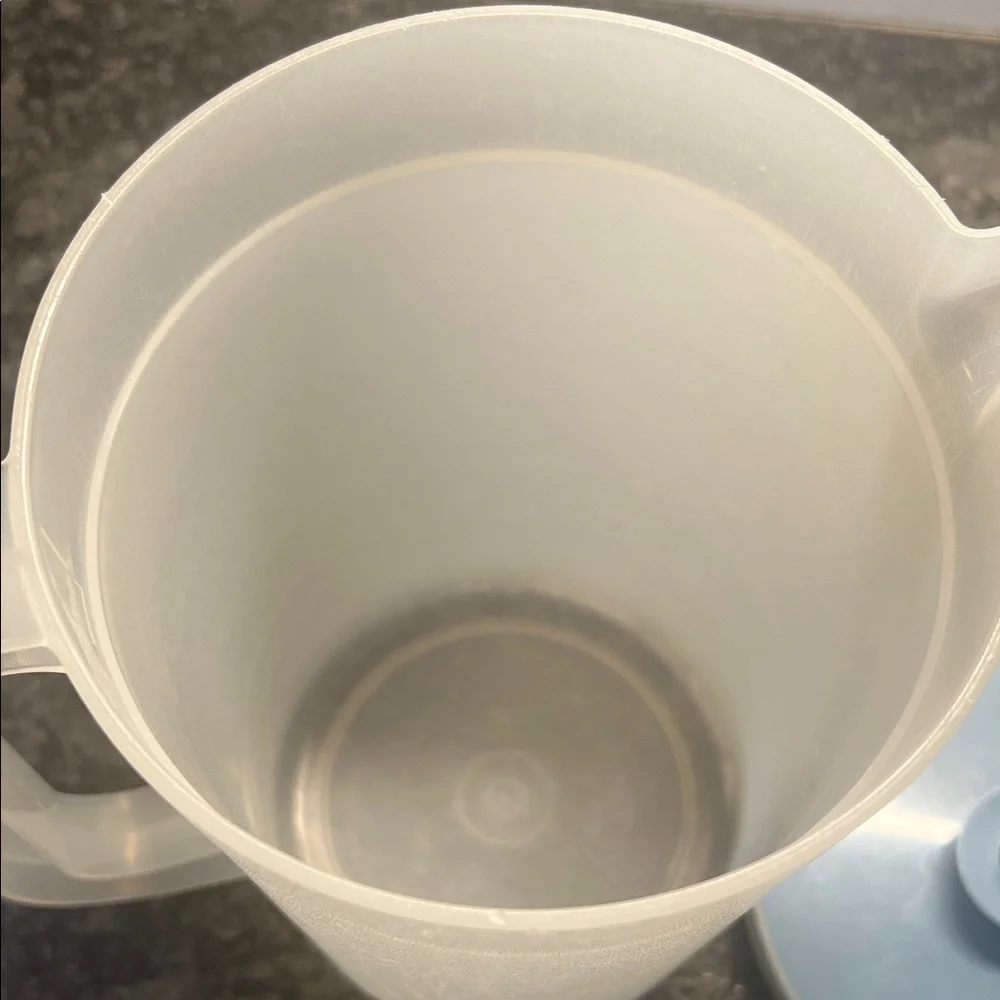 Half Gallon Tupperware Translucent White Pitcher with blue Lid. Great shape